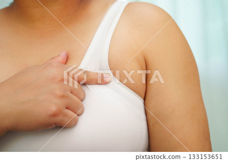 Asian big size overweight woman show armpit fat body. 133153651