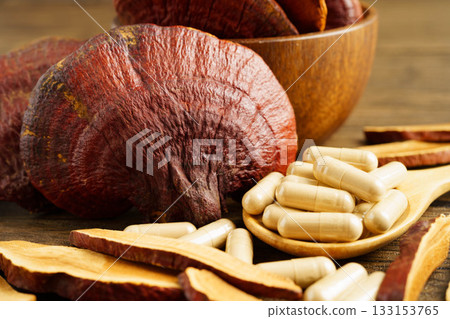 Lingzhi or Reishi mushroom with capsules, organic natural healthy food. 133153765