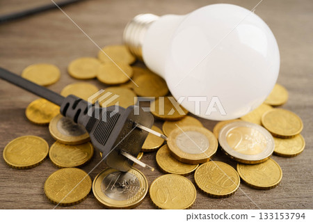 Cost of electric utilities with light bulb for payment. Cost of electric utilities with light bulb for payment. 133153794