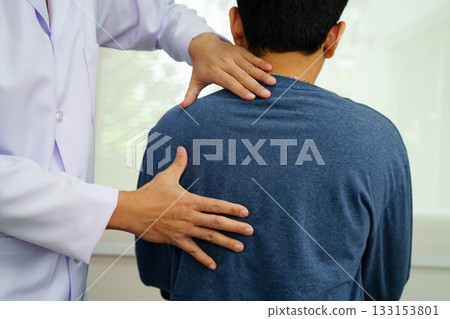Physical therapy, Asian therapist doctor treat perform pain therapy in hospital. Physical therapy, Asian therapist doctor treat perform pain therapy in hospital. 133153801