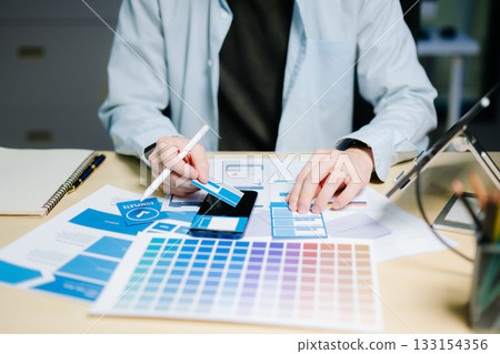 UX graphic designer planning application process development prototype wireframe for web smart phone. UX graphic designer planning application process development prototype wireframe for web smart phone. 133154356