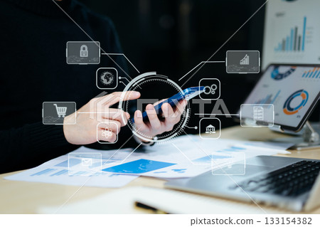 Digital marketing media in virtual screen.businesswoman hand working with mobile phone and modern compute Digital marketing media in virtual screen.businesswoman hand working with mobile phone and modern compute 133154382