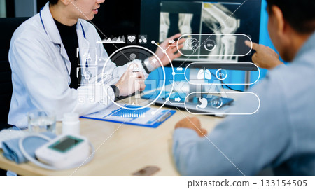 Doctor and patient discussing medical data with futuristic health interface overlay. Ideal for smart healthcare, diagnostics, AI in medicine Doctor and patient discussing medical data with futuristic health interface overlay. Ideal for smart healthcare, diagnostics, AI in medicine 133154505