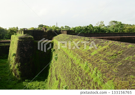 Aguada Fort is a built in 1612 along with a lighthouse, located on Sinquerim Beach in Goa, India, overlooking the Arabian Sea. The fort is a major tourist attraction. Aguada Fort is a built in 1612 along with a lighthouse, located on Sinquerim Beach in Goa, India, overlooking the Arabian Sea. The fort is a major tourist attraction. 133156765
