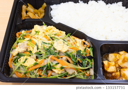 Delicious Chinese stir-fried pork, vegetables and eggs bento 133157731