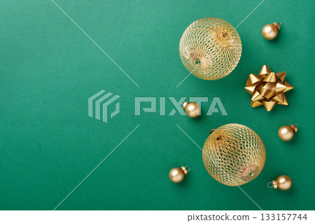 Golden baubles creating festive christmas and new year holiday flat lay, copy space 133157744