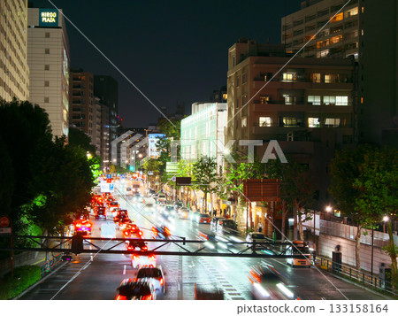 Evening view of Hiroo and Gaien Nishi Street from Tengenjibashi intersection. Cityscape (October 2025) 133158164