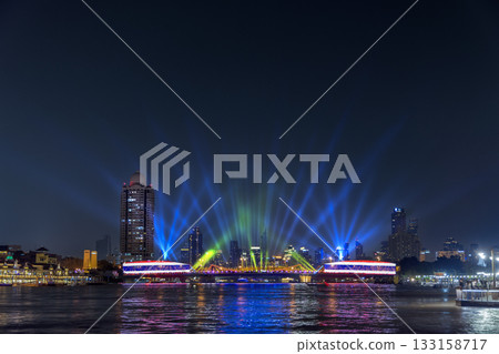 Memorial Bridge is a landmark of Bangkok with projection mapping during the Vijit Chao Phraya festival performance on the Chao Phraya River in Bangkok, Thailand. Memorial Bridge is a landmark of Bangkok with projection mapping during the Vijit Chao Phraya festival performance on the Chao Phraya River in Bangkok, Thailand. 133158717