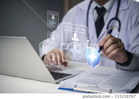 Doctor hand using digital medical record system on virtual screen, health data management, patient information, healthcare technology, telemedicine, hospital administration. Doctor hand using digital medical record system on virtual screen, health data management, patient information, healthcare technology, telemedicine, hospital administration. 133158767