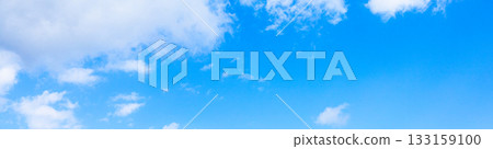 A simple landscape of blue sky and clouds A simple landscape of blue sky and clouds 133159100