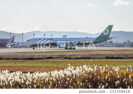 Sendai Airport at dusk, plane taxiing, Natori City, Miyagi Prefecture Sendai Airport at dusk, plane taxiing, Natori City, Miyagi Prefecture 133159419