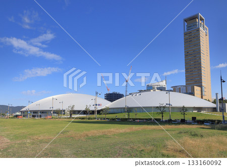 View of Anabuki Arena Kagawa and Takamatsu Symbol Tower from the seafront promenade side of Sunport Takamatsu 133160092