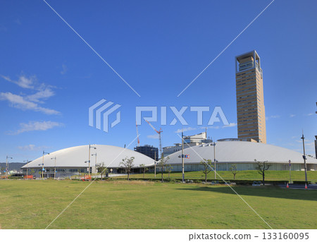 View of Anabuki Arena Kagawa and Takamatsu Symbol Tower from the seafront promenade side of Sunport Takamatsu 133160095