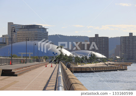 View of Anabuki Arena Kagawa at Sunport Takamatsu from Tamamo Breakwater 133160599