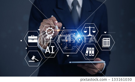 man holding a tablet with icons related to artificial intelligence, law, and justice. Modern legal system, data management, and legal advisory services. Judicial innovation and technology. man holding a tablet with icons related to artificial intelligence, law, and justice. Modern legal system, data management, and legal advisory services. Judicial innovation and technology. 133161030