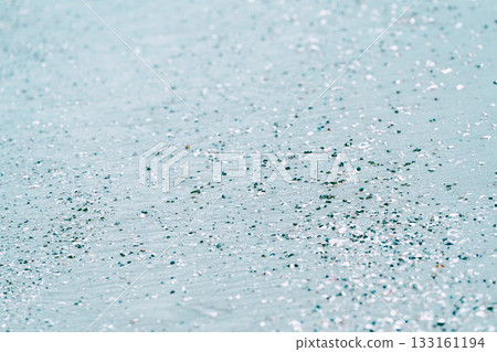 Sandy beach as the seawater recedes 133161194