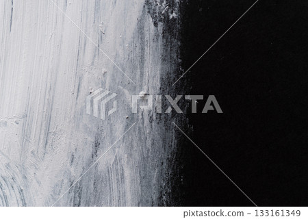 White paint on black construction paper 133161349