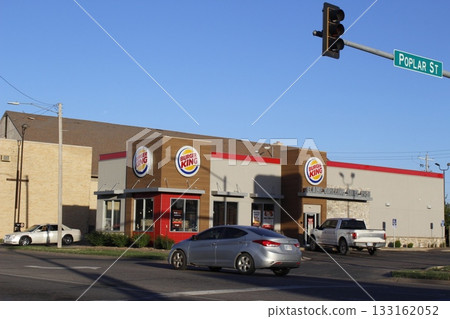 Burger King Fast Food Restaurant with blue sky outdoor Burger King Fast Food Restaurant with blue sky outdoor 133162052
