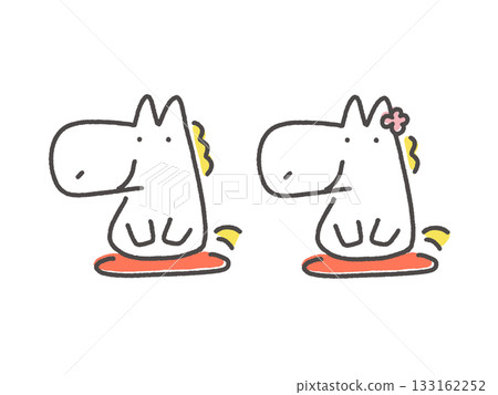 A couple of white horses sitting on cushions and greeting each other New Year's material 133162252