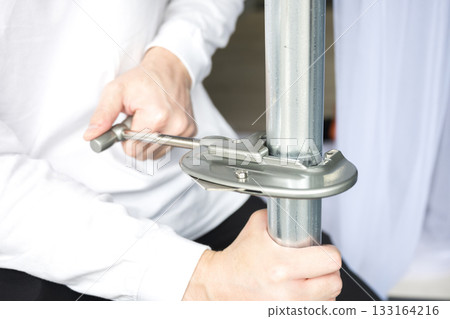 Construction work such as clamps to secure pipes Construction work such as clamps to secure pipes 133164216