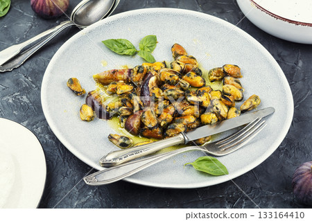 Delicious fried peeled mussels with figs Delicious fried peeled mussels with figs 133164410