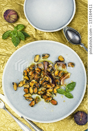 Mussels cooked with figs. Mussels cooked with figs. 133164411