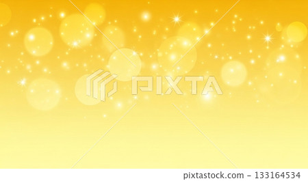 A fantastic background material with shining particles of light and bokeh balls on a warm yellow and orange gradation A fantastic background material with shining particles of light and bokeh balls on a warm yellow and orange gradation 133164534