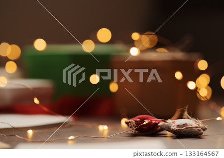 Closeup shot of textile christmas stars on walnut table 133164567