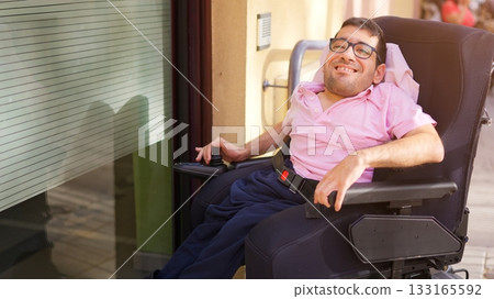Happy man with physical disability enjoying inclusion and accessibility outdoors 133165592