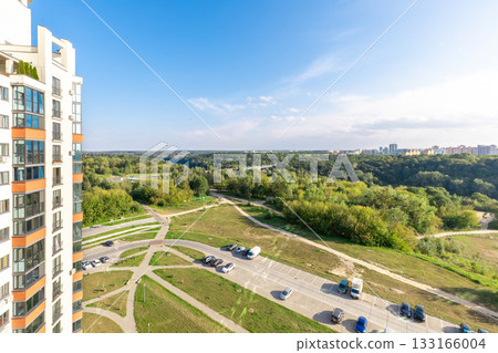 Modern Residential Building with Forest View and Blue Sky Modern Residential Building with Forest View and Blue Sky 133166004