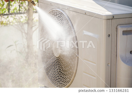 air conditioning compressor outdoor unit cleaning service with water spray 133166281
