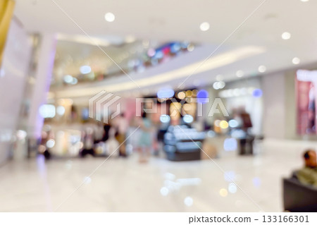 modern luxury shopping mall department store interior blur abstract background with bokeh light 133166301