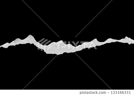 Ripped torn paper edges isolated on black background Ripped torn paper edges isolated on black background 133166331