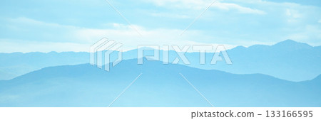 beautiful mountain view with clouds and blue sky beautiful mountain view with clouds and blue sky 133166595