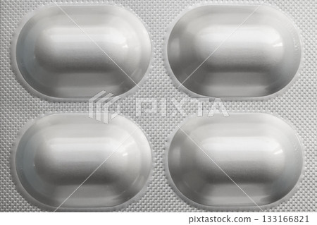 Medicine pill in aluminium foil silver blister packaging 133166821