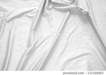 Abstract white wrinkled bedding sheet fabric texture background Abstract white wrinkled bedding sheet fabric texture background 133166863