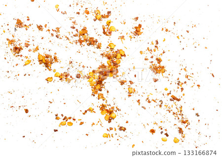 dried red chili pepper flakes and seeds isolated on white background dried red chili pepper flakes and seeds isolated on white background 133166874