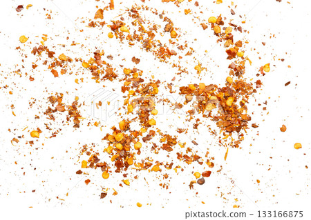 dried red chili pepper flakes and seeds isolated on white background dried red chili pepper flakes and seeds isolated on white background 133166875