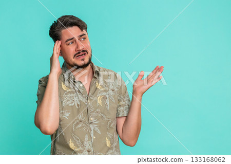 Adult man reacts with disappointment after failure bad result frustration Adult man reacts with disappointment after failure bad result frustration 133168062