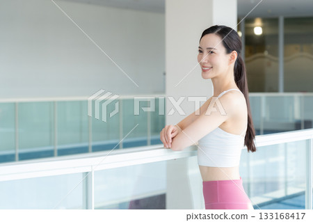 A young woman training at a sports gym. Photo courtesy of Sports Club & Sauna Spa Renaissance Makuhari 24 133168417