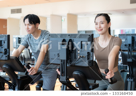 Young men and women training at a sports gym. Photo courtesy of Sports Club & Sauna Spa Renaissance Makuhari 24 Young men and women training at a sports gym. Photo courtesy of Sports Club & Sauna Spa Renaissance Makuhari 24 133168450