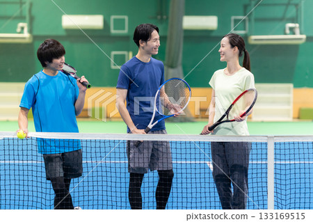 Young men and women playing tennis at a sports gym. Photo courtesy of Sports Club & Sauna Spa Renaissance Makuhari 24 Young men and women playing tennis at a sports gym. Photo courtesy of Sports Club & Sauna Spa Renaissance Makuhari 24 133169515