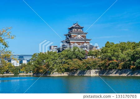 Hiroshima Castle Tower Shining Against the Blue Sky 133170703