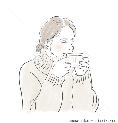 Young woman in a sweater drinking a hot drink 133170743