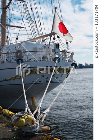 The Japanese flag of the sailing ship Kaiwomaru docked at Nagoya Port Garden Pier The Japanese flag of the sailing ship Kaiwomaru docked at Nagoya Port Garden Pier 133171704