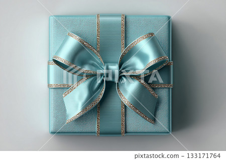 Gift giving. Blue box wrapped with a bow on white background. Jewelry, birthdays, Christmas and luxury branding. Gift giving. Blue box wrapped with a bow on white background. Jewelry, birthdays, Christmas and luxury branding. 133171764