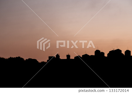 Silhouette of the park and the city, with beautiful sunset sky. Silhouette of the park and the city, with beautiful sunset sky. 133172014