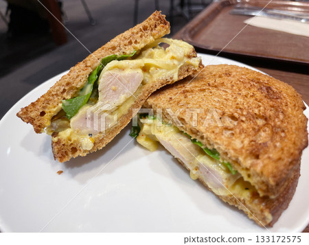 Chicken Fricassee Sandwich: A sandwich featuring creamy chicken. Chicken Fricassee Sandwich: A sandwich featuring creamy chicken. 133172575