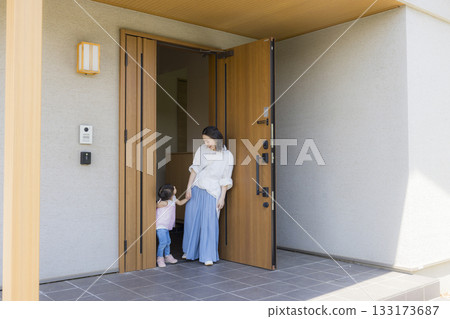 Family at the entrance going out 133173687
