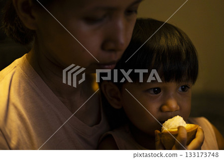 Close Up Mom And Toddler Are Eating Santol, A joyful ad photo of mom and toddler biting santol close up, juicy flesh dripping under soft light, perfect for tropical fruit or family documentary. Close Up Mom And Toddler Are Eating Santol, A joyful ad photo of mom and toddler biting santol close up, juicy flesh dripping under soft light, perfect for tropical fruit or family documentary. 133173748